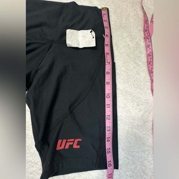 UFC Women's Black Bike Shorts with Red Logo and Side Pockets - Picture 10 of 12